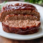 Jamie Oliver's turkey meatloaf served with vegetables and a flavorful sauce
